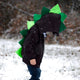 boy-playing-in-the-snow-ombre-green-black-hoodie