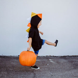 candy corn - sweatshirt - for - halloween - modeled-on-boy-with-pumpkin