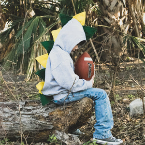 little-boy-playing-football-in-jeans-and-handmade-fashion-hoodie