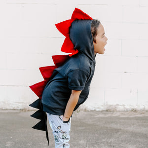 red spike fire dragon with black jacket on preschooler