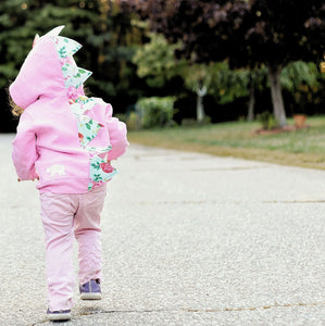 toddler girl pink dinosaur hoodie with rose floral spikes for play
